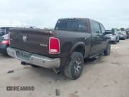 ✅ 2013 Ram 2500 Laramie • VIN: 3C6UR5NL9DG607630 • Lot: 42584918. Listed on IAAI with 255,212 mi. Free auction sales archive from the USA and detailed vehicle history report at DreamBid. Image 4.