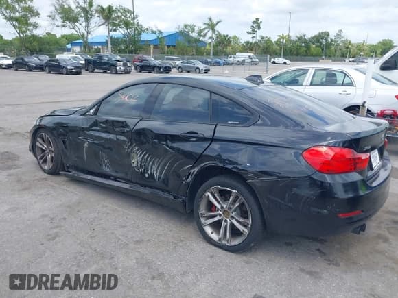 ✅ 2015 BMW 4 Series 428i xDrive • VIN: WBA4A7C55FD414405 • Lot: 39159752. Listed on IAAI with 121,009 mi. Free auction sales archive from the USA and detailed vehicle history report at DreamBid. Image 3.