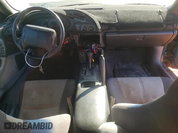 ✅ 1994 Chevrolet Camaro Z28 • VIN: 2G1FP32PXR2165558 • Лот: 77087374. Опубликован ранее на Copart с пробегом 151 008 миль. Бесплатный доступ к архиву аукционных продаж из США и подробный отчёт об истории автомобиля на DreamBid. Изображение 8.