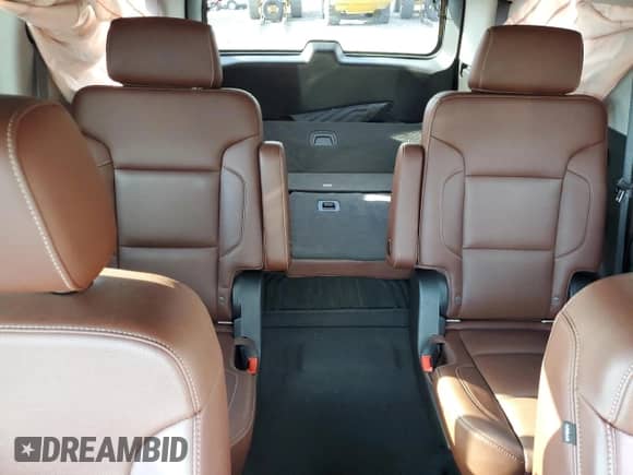 2020 Chevrolet Tahoe Premier with VIN 1GNSKCKJ0LR101198, listed as a Copart auction lot 84955895 with 99,414 mi miles and Salvage title. Bid and sale history available at DreamBid. Image 10.