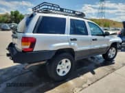 ✅ 2003 Jeep Grand Cherokee Laredo • VIN: 1J4GW48S63C556627 • Lot: 70764035. Listed on Copart with Not provided. Free auction sales archive from the USA and detailed vehicle history report at DreamBid. Image 3.