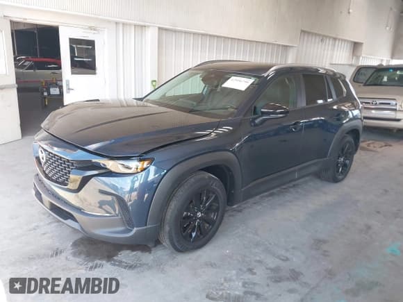 ✅ 2023 Mazda CX-50 S Preferred Plus • VIN: 7MMVABCM3PN129005 • Lot: 42996790. Wystawiony na IAAI z przebiegiem 34 792 mil. Bezpłatny archiwum sprzedaży aukcyjnych z USA i szczegółowy raport historii pojazdu na DreamBid. Zdjęcie 17.