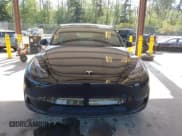 ✅ 2023 Tesla Model Y Long Range • VIN: 7SAYGDEE4PF694216 • Lot: 42180693. Listed on IAAI with 29,303 mi. Free auction sales archive from the USA and detailed vehicle history report at DreamBid. Image 12.