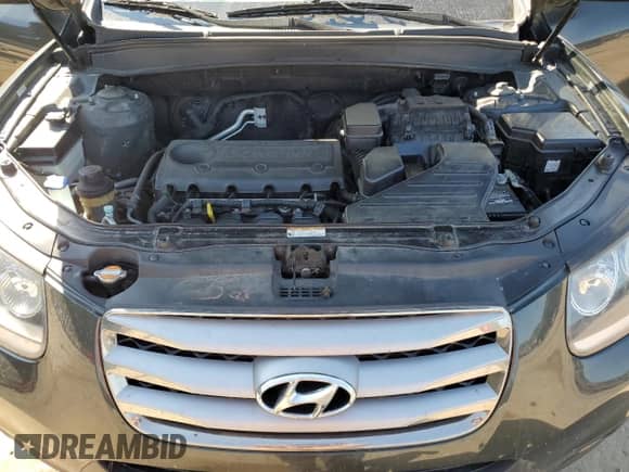 2012 Hyundai Santa Fe GLS с VIN 5XYZGDAB3CG126474, выставлен на аукционе Copart как лот 71576254 с пробегом 180 291 миль миль и Чистый • Clean title. История ставок и продаж доступна на DreamBid. Изображение 12.