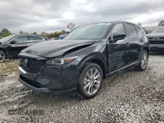 ✅ 2024 Mazda CX-5 S Premium Plus • VIN: JM3KFBEL1R0522548 • Лот: 85193055. Опубликован ранее на Copart с пробегом 29 227 миль. Бесплатный доступ к архиву аукционных продаж из США и подробный отчёт об истории автомобиля на DreamBid. Изображение 1.