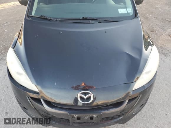 ✅ 2014 Mazda 5 Touring • VIN: JM1CW2CL8E0167999 • Лот: 82721605. Опубликован ранее на Copart с пробегом 207 258 миль. Бесплатный доступ к архиву аукционных продаж из США и подробный отчёт об истории автомобиля на DreamBid. Изображение 12.