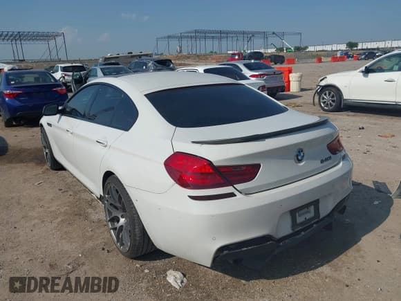 ✅ 2015 BMW 6 Series 640i • VIN: WBA6A0C58FD318879 • Lot: 42399723. Listed on IAAI with 94,917 mi. Free auction sales archive from the USA and detailed vehicle history report at DreamBid. Image 3.