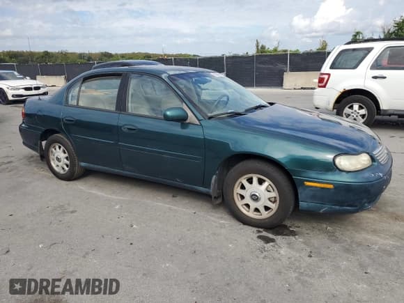 ✅ 1999 Chevrolet Malibu LS • VIN: 1G1NE52M8X6211533 • Lot: 91984505. Listed on Copart with Not provided. Free auction sales archive from the USA and detailed vehicle history report at DreamBid. Image 4.