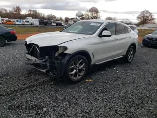 ✅ 2021 BMW X4 xDrive30i • VIN: 5UX2V1C05M9F95703 • Lot: 91612905. Listed on Copart with 55,581 mi. Free auction sales archive from the USA and detailed vehicle history report at DreamBid. Image 1.