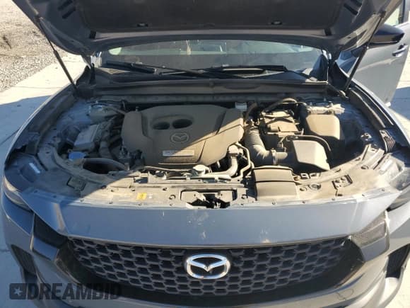 ✅ 2023 Mazda CX-50 Meridian Edition • VIN: 7MMVABXY6PN143140 • Lot: 82288955. Wystawiony na Copart z przebiegiem 42 860 mil. Bezpłatny archiwum sprzedaży aukcyjnych z USA i szczegółowy raport historii pojazdu na DreamBid. Zdjęcie 12.