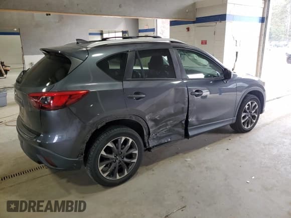 ✅ 2016 Mazda CX-5 Grand Touring • VIN: JM3KE4DY1G0776222 • Lot: 87483465. Listed on Copart with 66,376 mi. Free auction sales archive from the USA and detailed vehicle history report at DreamBid. Image 3.