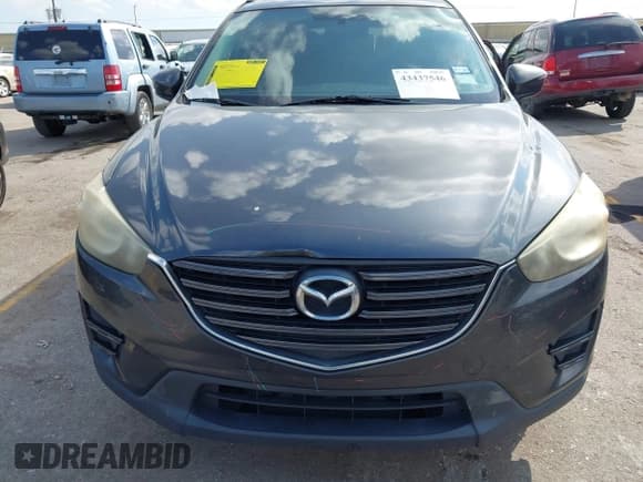 ✅ 2016 Mazda CX-5 Sport • VIN: JM3KE2BY0G0757538 • Лот: 43437546. Опубликован ранее на IAAI с пробегом 156 787 миль. Бесплатный доступ к архиву аукционных продаж из США и подробный отчёт об истории автомобиля на DreamBid. Изображение 12.