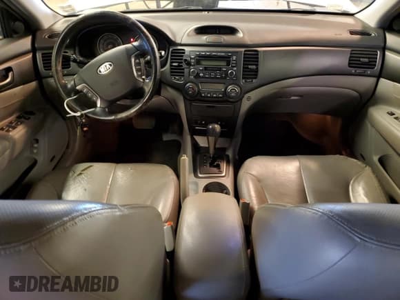 ✅ 2007 Kia Optima LX • VIN: KNAGE123475109066 • Lot: 41294354. Wystawiony na Copart z przebiegiem 134 888 mil. Bezpłatny archiwum sprzedaży aukcyjnych z USA i szczegółowy raport historii pojazdu na DreamBid. Zdjęcie 8.