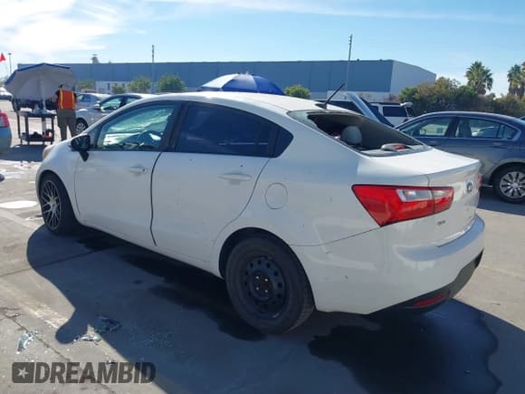 ✅ 2013 Kia Rio LX • VIN: KNADM4A31D6302306 • Lot: 43652171. Listed on IAAI with 141,467 mi. Free auction sales archive from the USA and detailed vehicle history report at DreamBid. Image 3.