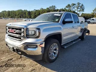 ✅ 2016 GMC Sierra 1500 SLT • VIN: 3GTU2NECXGG289289 • Lot: 87111055. Listed on Copart with 176,559 mi. Free auction sales archive from the USA and detailed vehicle history report at DreamBid. Image 1.