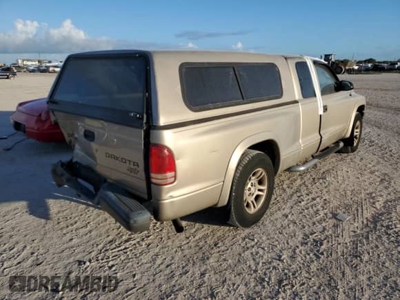 2004 Dodge Dakota with VIN 1D7GL12K94S627063, listed as a Copart auction lot 75315764 with 202,412 mi miles and Salvage title. Bid and sale history available at DreamBid. Image 3.