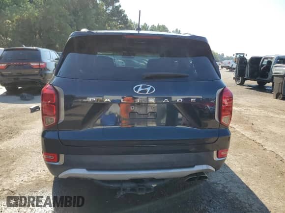 2021 Hyundai Palisade SEL с VIN KM8R24HE7MU177115, выставлен на аукционе Copart как лот 74379354 с пробегом 99 498 миль миль и Списание • Salvage title. История ставок и продаж доступна на DreamBid. Изображение 6.