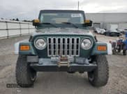 ✅ 2000 Jeep Wrangler Sahara • VIN: 1J4FA59S7YP750730 • Лот: 90633835. Опубликован ранее на Copart с пробегом 151 136 миль. Бесплатный доступ к архиву аукционных продаж из США и подробный отчёт об истории автомобиля на DreamBid. Изображение 5.