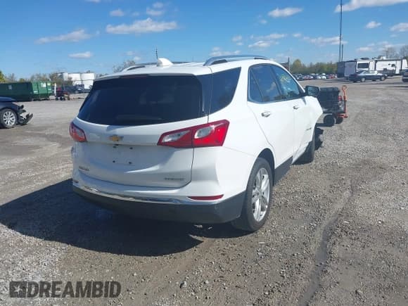 ✅ 2019 Chevrolet Equinox Premier • VIN: 2GNAXNEV6K6100056 • Лот: 43483243. Опубликован ранее на IAAI с пробегом 107 558 миль. Бесплатный доступ к архиву аукционных продаж из США и подробный отчёт об истории автомобиля на DreamBid. Изображение 4.