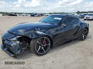 ✅ 2021 Toyota Supra 3.0 • VIN: WZ1DB0C00MW042681 • Лот: 59174324. Опубликован ранее на Copart с пробегом 7 718 миль. Бесплатный доступ к архиву аукционных продаж из США и подробный отчёт об истории автомобиля на DreamBid. Изображение 1.