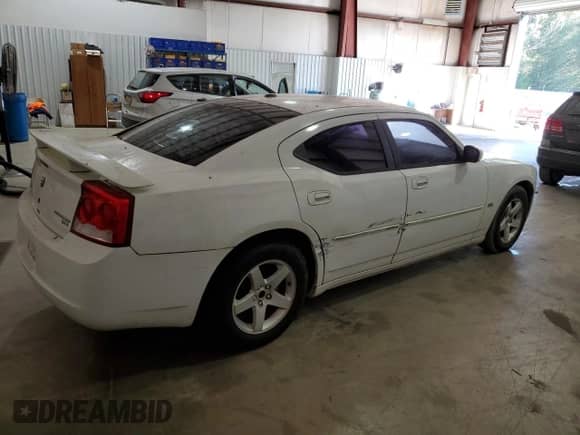 2010 Dodge Charger SXT с VIN 2B3CA3CV5AH258922, выставлен на аукционе Copart как лот 76128064 с пробегом 234 646 миль миль и Списание • Salvage title. История ставок и продаж доступна на DreamBid. Изображение 3.