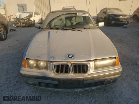 1998 BMW 3 Series 328i с VIN WBABK8330WEY89818, выставлен на аукционе Copart как лот 41557015 с пробегом 253 522 миль миль и На запчасти • Non repairable. История ставок и продаж доступна на DreamBid. Изображение 5.