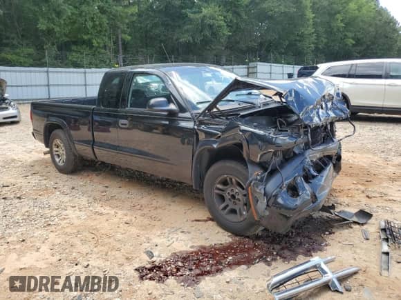 2004 Dodge Dakota Sport z VIN 1D7GL32K64S573944, wystawiony jako Copart lot #65445125 z przebiegiem 159 375 mil mil oraz Szkoda całkowita • Salvage title. Historia ofert i sprzedaży dostępna na DreamBid. Obrazek 4.