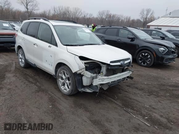 ✅ 2017 Subaru Forester Touring • VIN: JF2SJAWC9HH808164 • Lot: 43699516. Listed on IAAI with 102,065 mi. Free auction sales archive from the USA and detailed vehicle history report at DreamBid. Image 1.