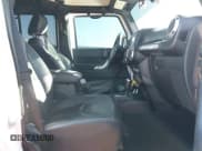 ✅ 2017 Jeep Wrangler Unlimited Rubicon • VIN: 1C4BJWFG3HL597572 • Lot: 40877947. Wystawiony na IAAI z przebiegiem 162 923 mil. Bezpłatny archiwum sprzedaży aukcyjnych z USA i szczegółowy raport historii pojazdu na DreamBid. Zdjęcie 5.