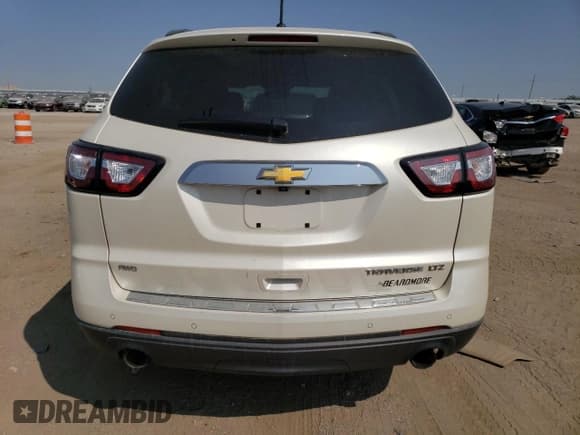 ✅ 2014 Chevrolet Traverse LTZ • VIN: 1GNKVJKD0EJ171565 • Lot: 70861504. Wystawiony na Copart z przebiegiem 83 706 mil. Bezpłatny archiwum sprzedaży aukcyjnych z USA i szczegółowy raport historii pojazdu na DreamBid. Zdjęcie 6.