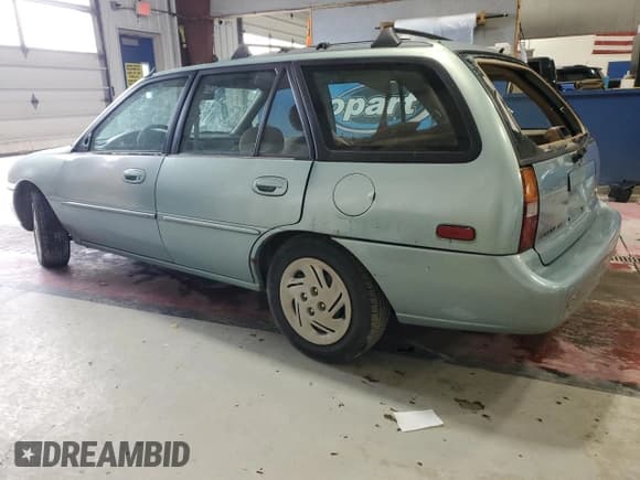 ✅ 1997 Ford Escort LX • VIN: 3FALP15P9VR107467 • Lot: 76061074. Listed on Copart with 69,873 mi. Free auction sales archive from the USA and detailed vehicle history report at DreamBid. Image 2.