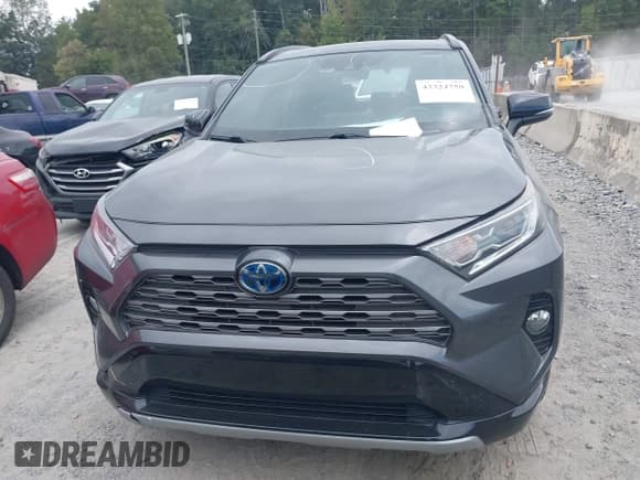 ✅ 2019 Toyota RAV4 Hybrid XSE • VIN: 2T3EWRFV2KW034791 • Lot: 43324750. Listed on IAAI with 90,789 mi. Free auction sales archive from the USA and detailed vehicle history report at DreamBid. Image 12.
