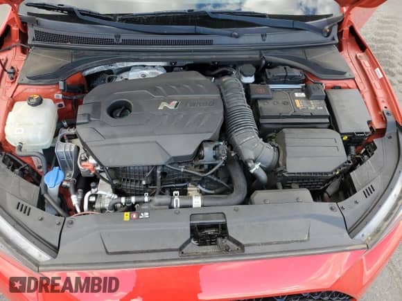 2020 Hyundai Veloster z VIN KMHT36AH2LU003485, wystawiony jako Copart lot #76160994 z przebiegiem Nie podano mil oraz Szkoda całkowita • Salvage title. Historia ofert i sprzedaży dostępna na DreamBid. Obrazek 12.