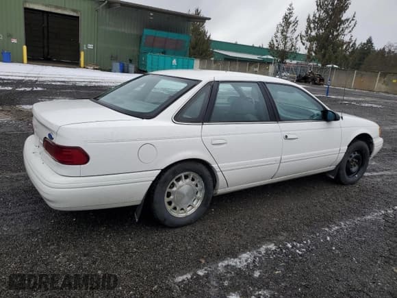 ✅ 1994 Ford Taurus • VIN: 1FALP5344RA291510 • Лот: 43854925. Опубликован ранее на Copart с пробегом 69 067 миль. Бесплатный доступ к архиву аукционных продаж из США и подробный отчёт об истории автомобиля на DreamBid. Изображение 3.