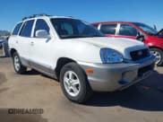 ✅ 2004 Hyundai Santa Fe GLS • VIN: KM8SC13E44U672070 • Lot: 43383997. Listed on IAAI with 219,150 mi. Free auction sales archive from the USA and detailed vehicle history report at DreamBid. Image 1.