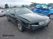 ✅ 2001 Cadillac Eldorado ESC • VIN: 1G6EL12Y01B107760 • Lot: 42797121. Wystawiony na IAAI z przebiegiem 86 446 mil. Bezpłatny archiwum sprzedaży aukcyjnych z USA i szczegółowy raport historii pojazdu na DreamBid. Zdjęcie 6.