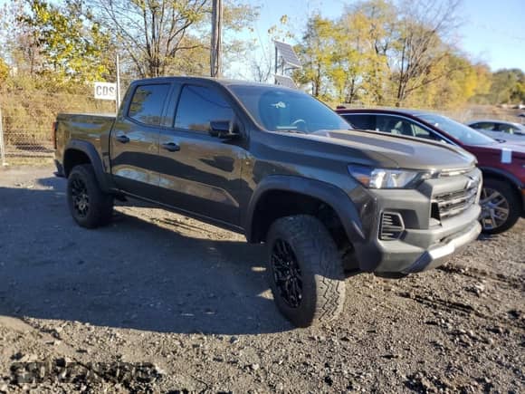 2023 Chevrolet Colorado 4WD Trail Boss z VIN 1GCPTEEK9P1139013, wystawiony jako Copart lot #90549425 z przebiegiem 263 mil mil oraz Nie do naprawy • Non repairable. Historia ofert i sprzedaży dostępna na DreamBid. Obrazek 4.