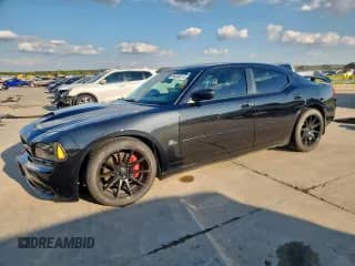 2006 Dodge Charger SRT-8 с VIN 2B3KA73W96H288105, выставлен на аукционе Copart как лот 84009015 с пробегом 83 880 миль миль и Списание • Salvage title. История ставок и продаж доступна на DreamBid. Изображение 1.
