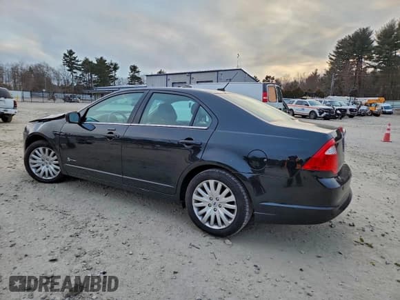 ✅ 2012 Ford Fusion Hybrid • VIN: 3FADP0L37CR202492 • Лот: 95933205. Опубликован ранее на Copart с пробегом 50 666 миль. Бесплатный доступ к архиву аукционных продаж из США и подробный отчёт об истории автомобиля на DreamBid. Изображение 2.