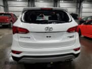 ✅ 2017 Hyundai Santa Fe Ultimate • VIN: 5XYZWDLA1HG407851 • Лот: 73932643. Опубликован ранее на Copart с пробегом 59 957 миль. Бесплатный доступ к архиву аукционных продаж из США и подробный отчёт об истории автомобиля на DreamBid. Изображение 6.