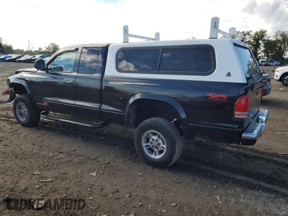 1999 Dodge Dakota SLT z VIN 1B7GG22X8XS105819, wystawiony jako Copart lot #84219405 z przebiegiem 130 962 mil mil oraz Szkoda całkowita • Salvage title. Historia ofert i sprzedaży dostępna na DreamBid. Obrazek 2.