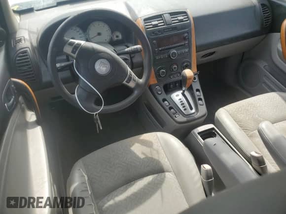 2007 Saturn VUE V6 z VIN 5GZCZ53467S858553, wystawiony jako Copart lot #74061804 z przebiegiem 152 358 mil mil oraz Szkoda całkowita • Salvage title. Historia ofert i sprzedaży dostępna na DreamBid. Obrazek 8.