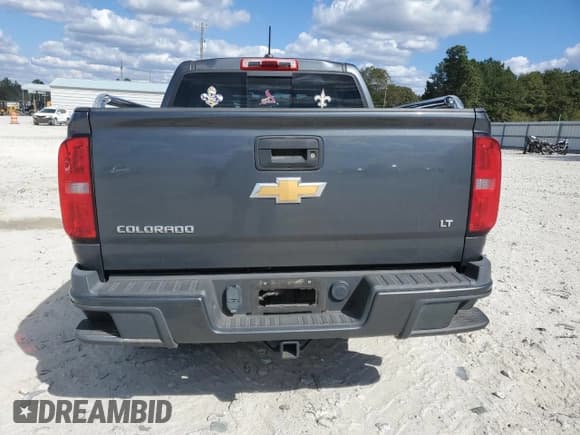 ✅ 2016 Chevrolet Colorado 2WD LT • VIN: 1GCGSCE33G1343001 • Лот: 86334515. Опубликован ранее на Copart с пробегом 61 103 миль. Бесплатный доступ к архиву аукционных продаж из США и подробный отчёт об истории автомобиля на DreamBid. Изображение 6.