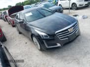 ✅ 2015 Cadillac CTS Luxury AWD • VIN: 1G6AX5SX5F0109217 • Lot: 42983192. Listed on IAAI with 54,841 mi. Free auction sales archive from the USA and detailed vehicle history report at DreamBid. Image 1.