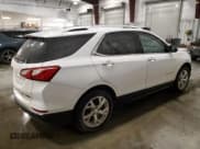 ✅ 2018 Chevrolet Equinox Premier • VIN: 2GNAXVEVXJ6121202 • Lot: 92875885. Listed on Copart with 122,946 mi. Free auction sales archive from the USA and detailed vehicle history report at DreamBid. Image 3.