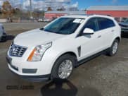 ✅ 2015 Cadillac SRX Luxury Collection • VIN: 3GYFNEE37FS572187 • Lot: 43544677. Listed on IAAI with 131,314 mi. Free auction sales archive from the USA and detailed vehicle history report at DreamBid. Image 2.