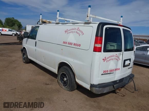 ✅ 2005 Chevrolet Express Cargo • VIN: 1GCFH15T451183397 • Lot: 43156084. Listed on IAAI with 154,198 mi. Free auction sales archive from the USA and detailed vehicle history report at DreamBid. Image 3.