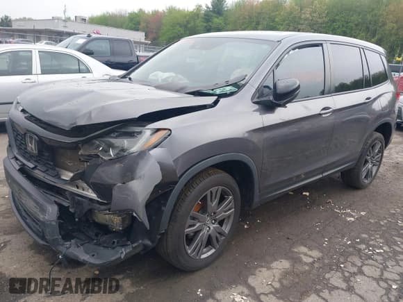 ✅ 2021 Honda Passport EX-L • VIN: 5FNYF8H57MB017062 • Lot: 42181992. Wystawiony na IAAI z przebiegiem Nie podano. Bezpłatny archiwum sprzedaży aukcyjnych z USA i szczegółowy raport historii pojazdu na DreamBid. Zdjęcie 2.