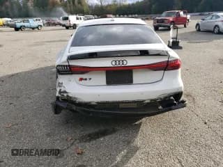 ✅ 2021 Audi RS 7 • VIN: WUAPCBF28MN900442 • Лот: 76716614. Опубликован ранее на Copart с пробегом 41 396 миль. Бесплатный доступ к архиву аукционных продаж из США и подробный отчёт об истории автомобиля на DreamBid. Изображение 6.