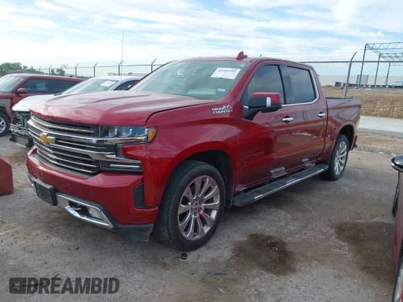 2019 Chevrolet Silverado 1500 High Country with VIN 3GCUYHED4KG141754, listed as a IAAI auction lot 42292251 with 114,161 mi miles and . Bid and sale history available at DreamBid. Image 2.